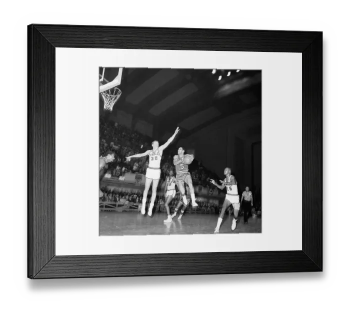 Framed Print : Player Shooting Ball in Basketball Game Framed Print : Player Shooting Ball in Basketball Game