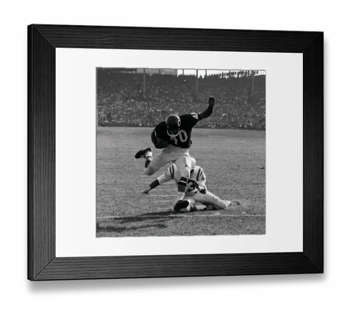 Framed Print : Gale Sayers Eluding Tackle During Football Game Framed Print : Gale Sayers Eluding Tackle During Football Game