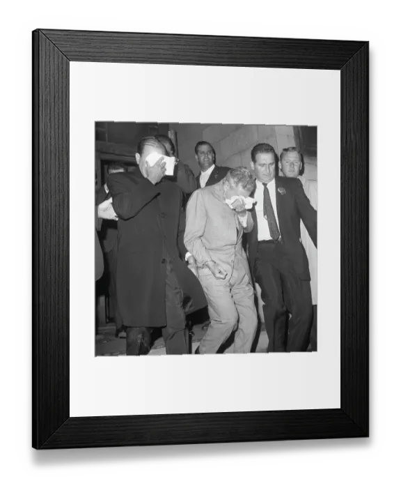 Framed Print : Mobsters Cover Their Faces Leaving Police Station