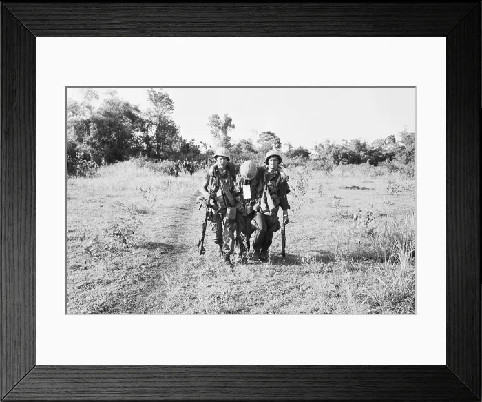 Framed Print : Medics Assist Wounded Marine in Vietnam Framed Print : Medics Assist Wounded Marine in Vietnam