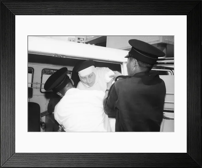 Framed Print : Mother Superior Winfred Duff Being Assisted from Ambulance Framed Print : Mother Superior Winfred Duff Being Assisted from Ambulance
