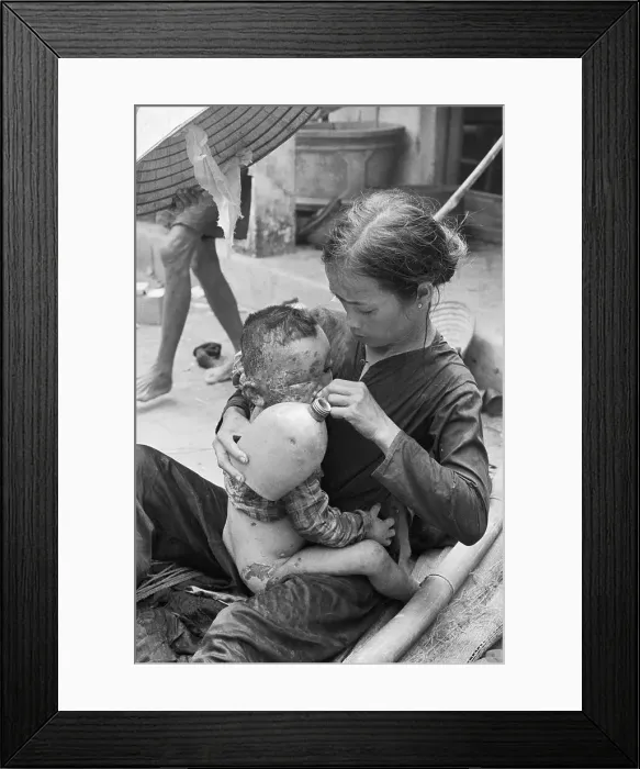 Framed Print : Vietnamese Mother Gives Burned Child Water Framed Print : Vietnamese Mother Gives Burned Child Water