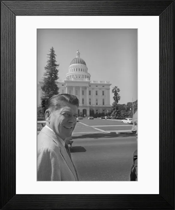 Framed Print : Ronald Reagan Passin the State Capital Building