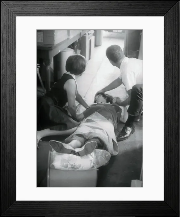 Framed Print : Man and Woman Comforting a Shooting Victim Framed Print : Man and Woman Comforting a Shooting Victim