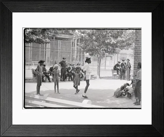 Framed Print : Children Playing Near Group of Police Officers Framed Print : Children Playing Near Group of Police Officers