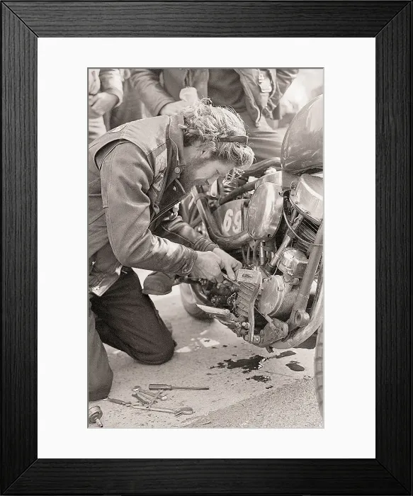 Framed Print : Man Works on Oil Gauge on Motorcycle Framed Print : Man Works on Oil Gauge on Motorcycle