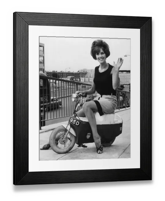 Framed Print : Miniskirt Model on Mini-Scooter Framed Print : Miniskirt Model on Mini-Scooter
