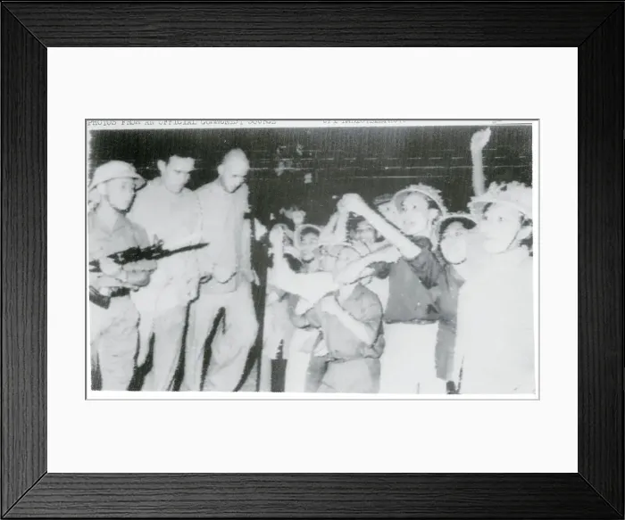 Framed Print : US Airmen Jeered by North Vietnamese Framed Print : US Airmen Jeered by North Vietnamese