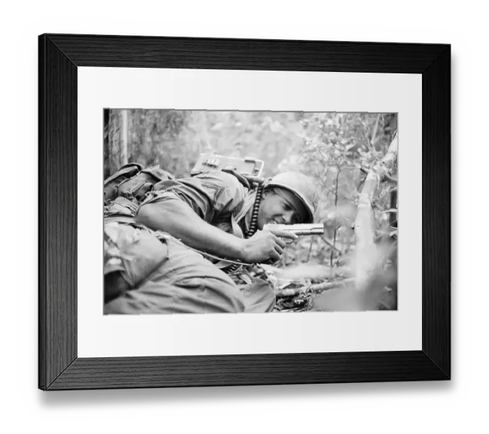 Framed Print : American Soldier Taking Cover with a Weapon
