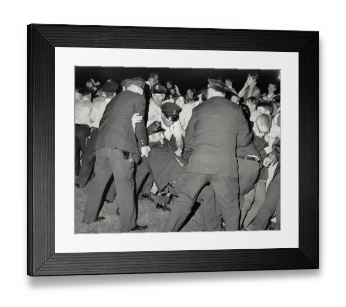 Framed Print : Police Pick Up Fallen Officer in Crowd
