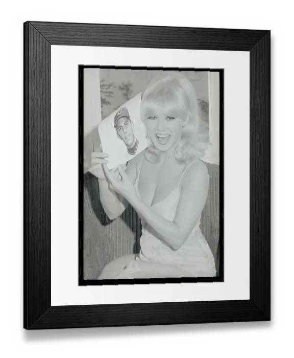 Framed Print : Mamie Van Doren Posing with Picture in Her Hand Framed Print : Mamie Van Doren Posing with Picture in Her Hand