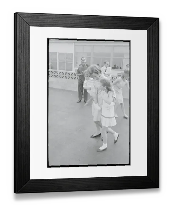 Framed Print : Robert and Ethel Kennedy Carrying Their Children Framed Print : Robert and Ethel Kennedy Carrying Their Children
