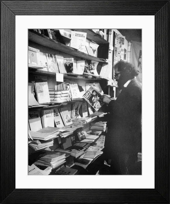 Framed Print : Allen Ginsberg Reading a Magazine Framed Print : Allen Ginsberg Reading a Magazine