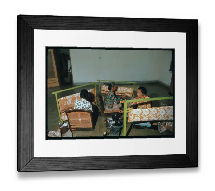 Framed Print : Women Applying Wax to Fabric Framed Print : Women Applying Wax to Fabric