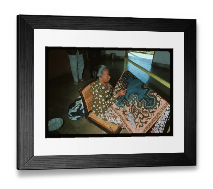 Framed Print : Woman Applying Wax to Fabric Framed Print : Woman Applying Wax to Fabric