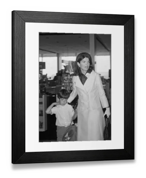 Framed Print : Weary John F. Kennedy Jr. with His Mother in Airport Framed Print : Weary John F. Kennedy Jr. with His Mother in Airport