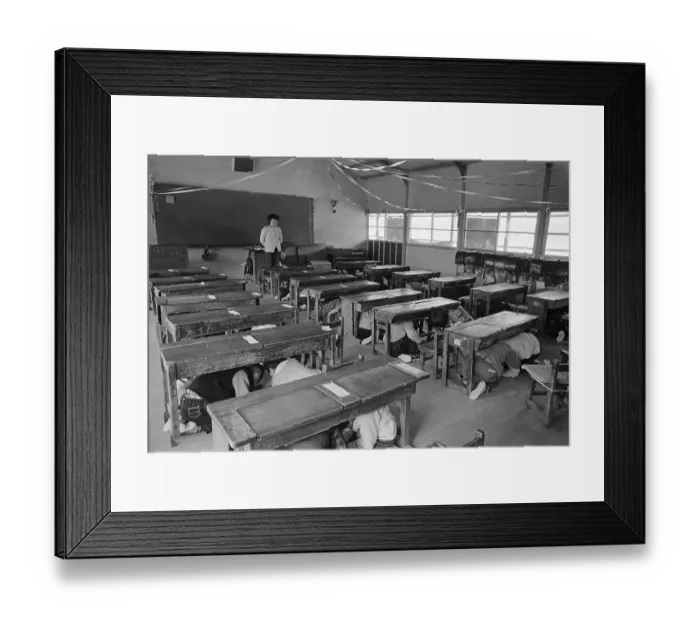 Framed Print : Children Crouched Under Schoolroom Desks Framed Print : Children Crouched Under Schoolroom Desks