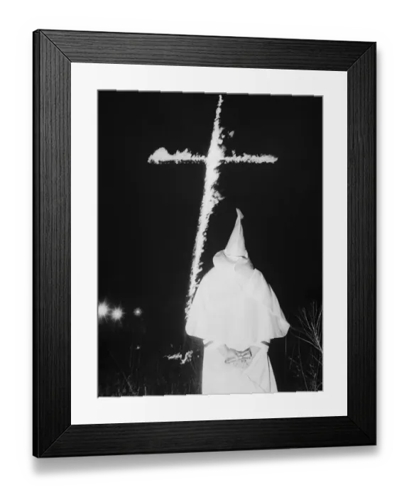 Framed Print : Ku Klux Klansman Looking at Burning Cross Framed Print : Ku Klux Klansman Looking at Burning Cross