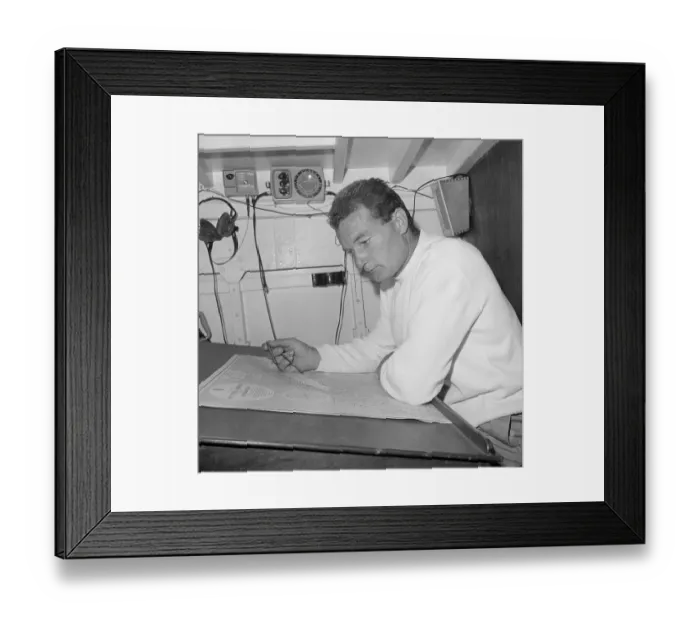 Framed Print : Yachtsman Eric Tabarly Studying Voyage Chart Framed Print : Yachtsman Eric Tabarly Studying Voyage Chart