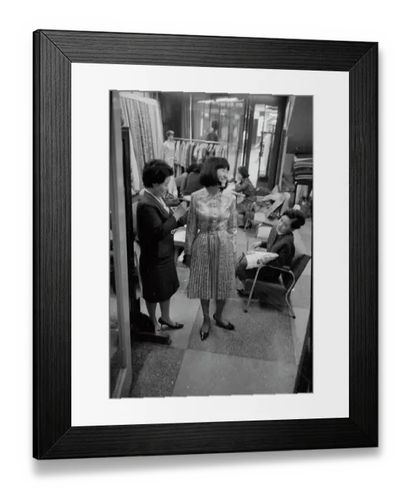 Framed Print : Woman Trying on Dress Framed Print : Woman Trying on Dress