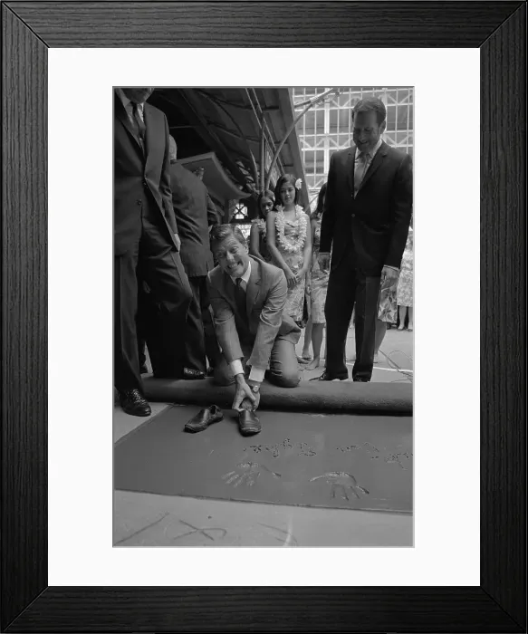 Framed Print : Dick Van Dyke Making a Footprint