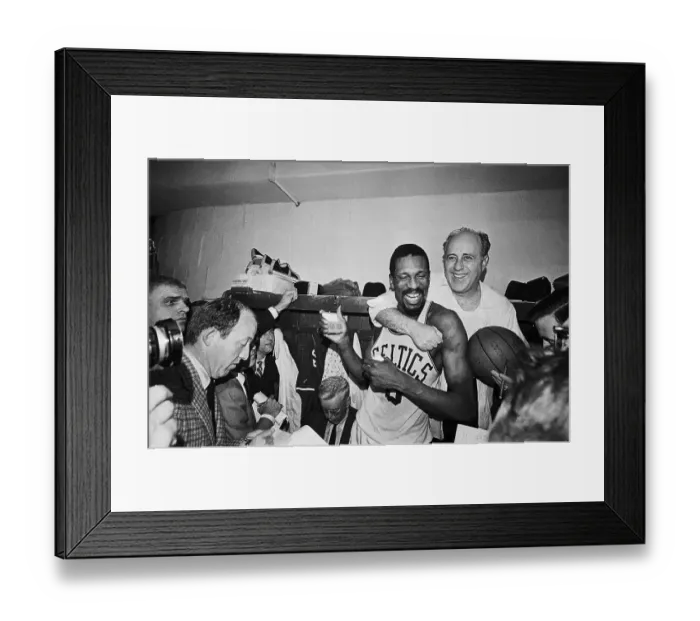 Framed Print : Red Auerbach Hugging Bill Russell at Press Conference