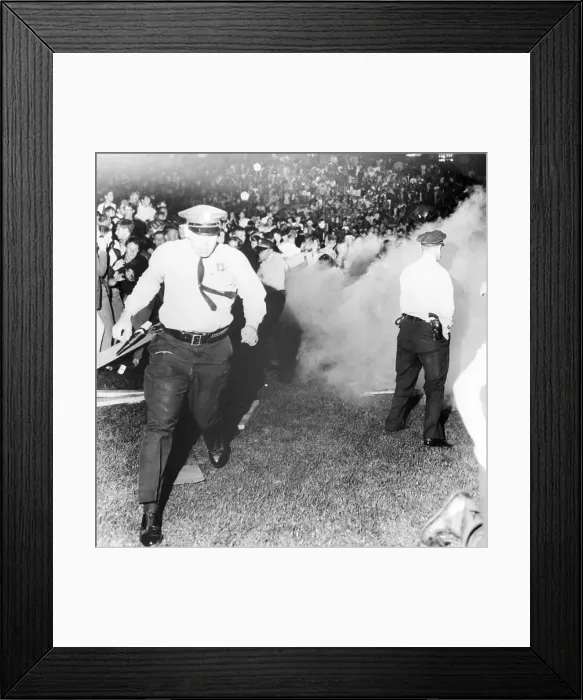 Framed Print : Police Run from Tear Gas at Rolling Stones Show Framed Print : Police Run from Tear Gas at Rolling Stones Show