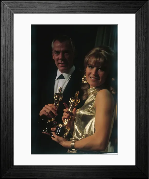 Framed Print : Lee Marvin and Julie Christie Holding Their Oscar Awards Framed Print : Lee Marvin and Julie Christie Holding Their Oscar Awards