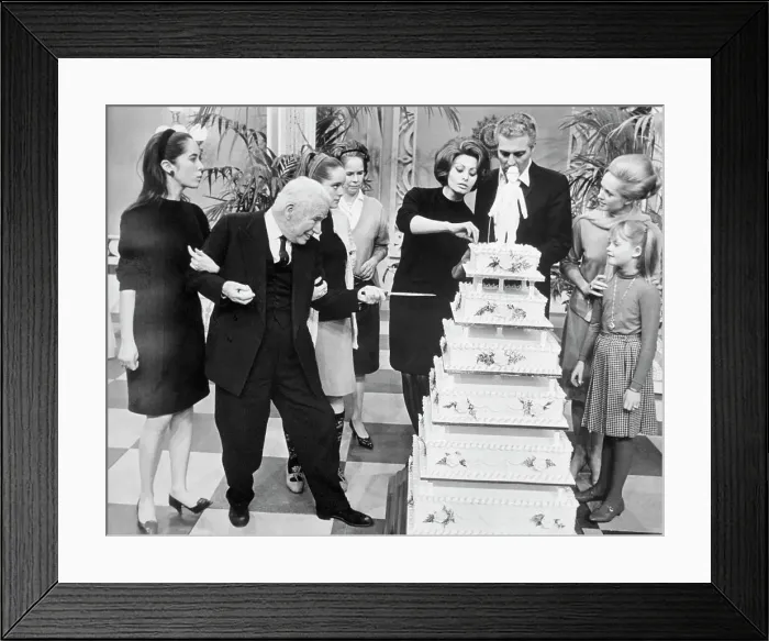 Framed Print : Charlie Chaplin Stabbing Birthday Cake Framed Print : Charlie Chaplin Stabbing Birthday Cake