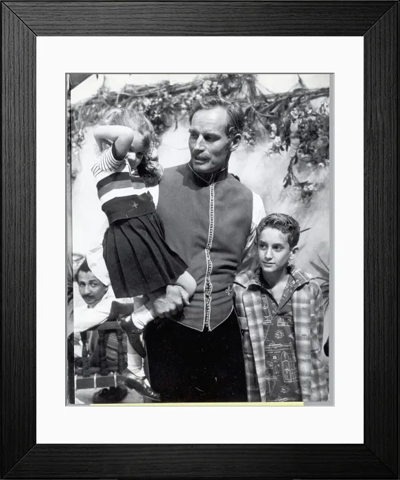 Framed Print : Charlton Heston with Children on Khartoum Set Framed Print : Charlton Heston with Children on Khartoum Set
