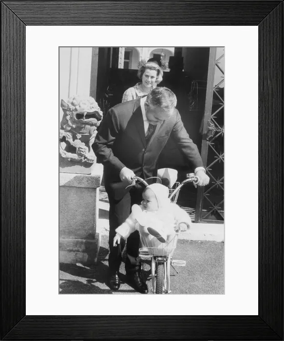 Framed Print : Prince Rainier Pushing Prince Albert on Bicycle Framed Print : Prince Rainier Pushing Prince Albert on Bicycle
