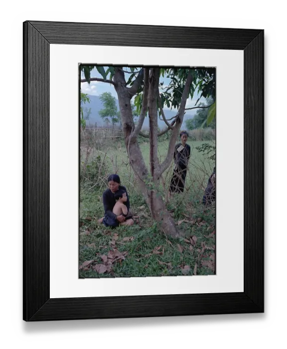 Framed Print : Viet Cong Supporter Seated with Her Baby