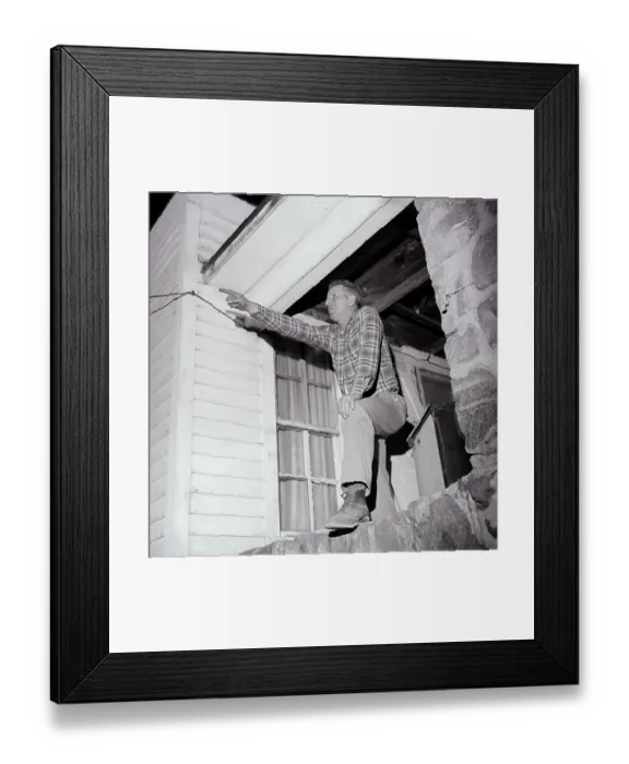 Framed Print : Man On Porch Pointing Toward Sky Framed Print : Man On Porch Pointing Toward Sky