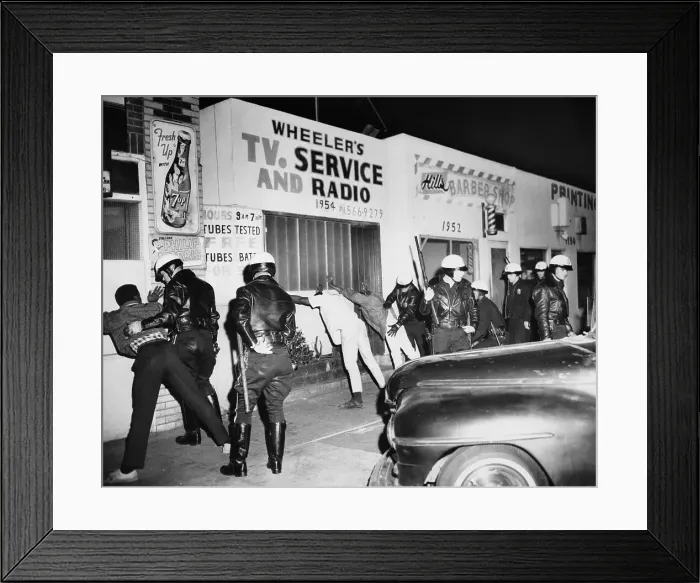Framed Print : Police Officers Searching Rioters Framed Print : Police Officers Searching Rioters