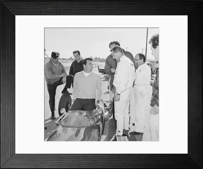 Framed Print : James Garner Slipping into a Race Car Framed Print : James Garner Slipping into a Race Car