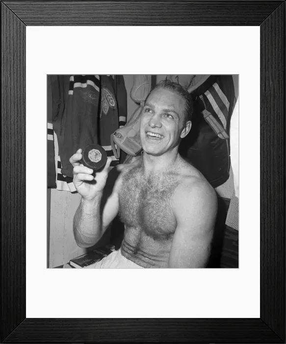 Framed Print : Bobby Hull in Locker Room With Hockey Puck Framed Print : Bobby Hull in Locker Room With Hockey Puck