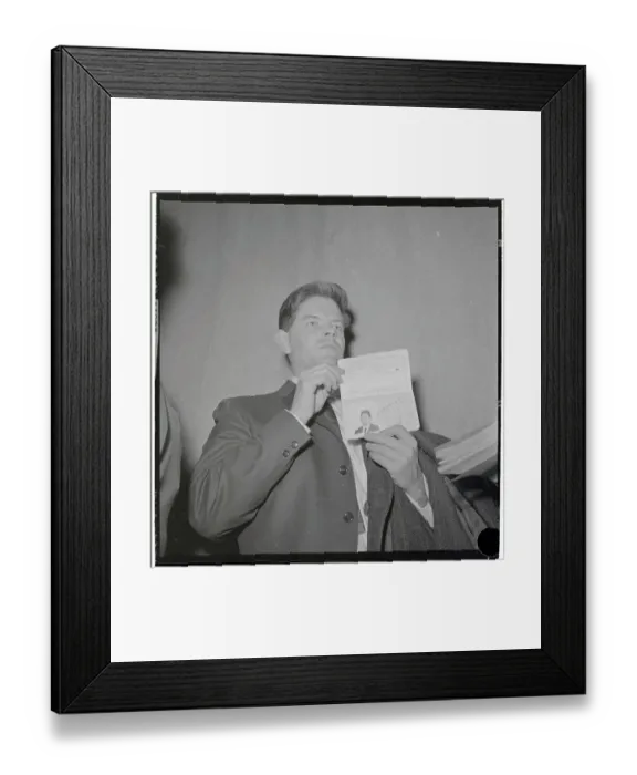 Framed Print : Staughton Lynd Holding up Passport for Press Framed Print : Staughton Lynd Holding up Passport for Press