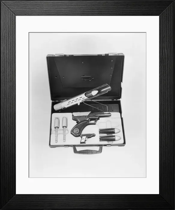 Framed Print : James Bond Toy Weapons in Briefcase Framed Print : James Bond Toy Weapons in Briefcase