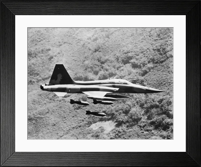 Framed Print : Fighter Releasing Load of Bombs Over Vietnam Framed Print : Fighter Releasing Load of Bombs Over Vietnam
