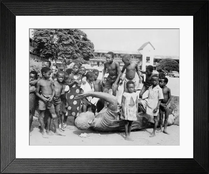 Framed Print : Children Play on Fallen Statue Framed Print : Children Play on Fallen Statue