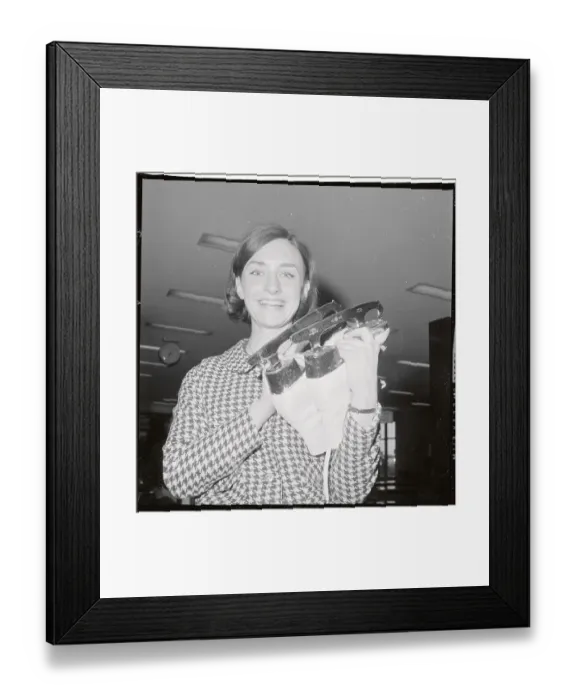 Framed Print : Peggy Fleming Holding Ice Skates Framed Print : Peggy Fleming Holding Ice Skates