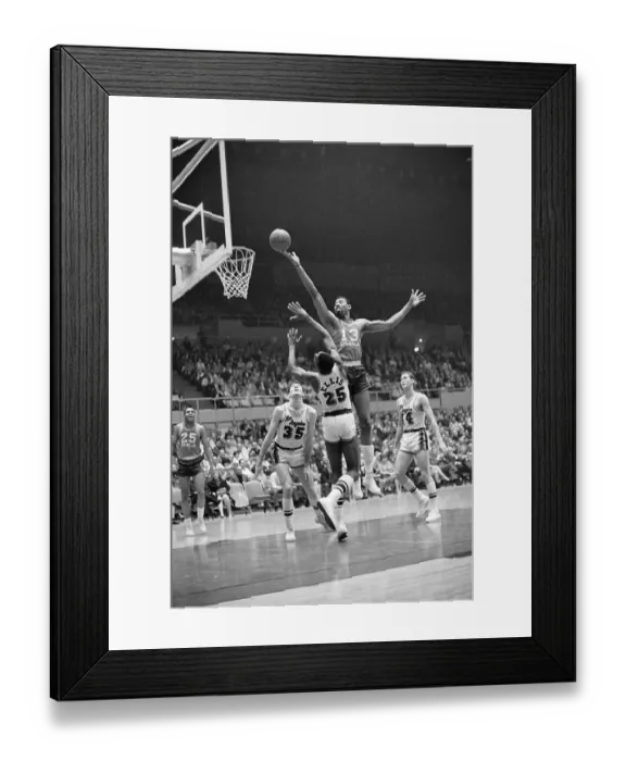 Framed Print : Wilt Chamberlain Jumping Over LeRoy Ellis