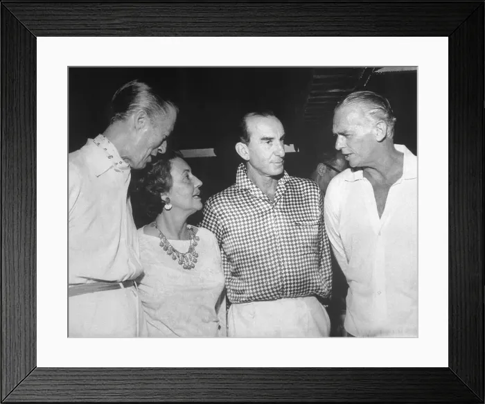 Framed Print : Actor Douglas Fairbanks Jr. and Wife Conversing at Emilio Pucci Party Framed Print : Actor Douglas Fairbanks Jr. and Wife Conversing at Emilio Pucci Party