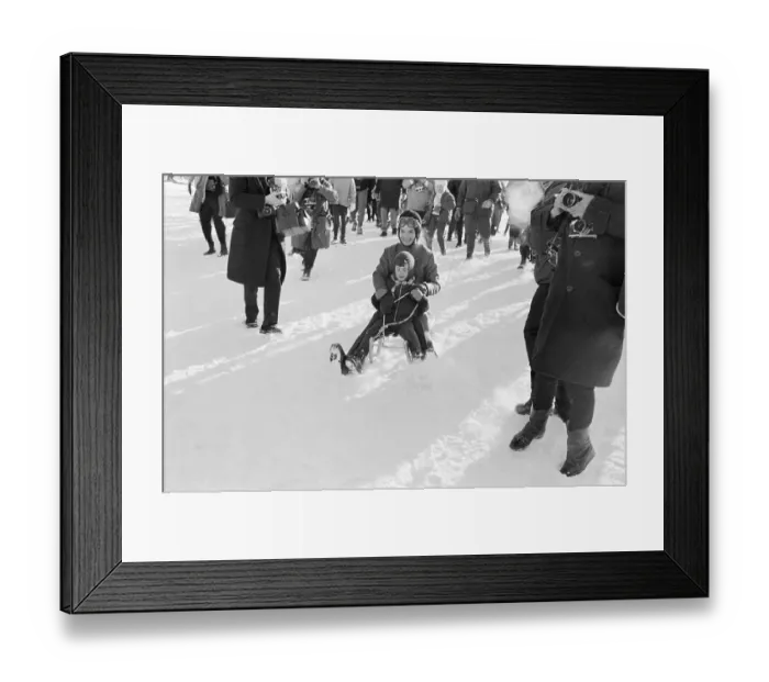 Framed Print : Mrs. John F. Kennedy and John Sledding Framed Print : Mrs. John F. Kennedy and John Sledding