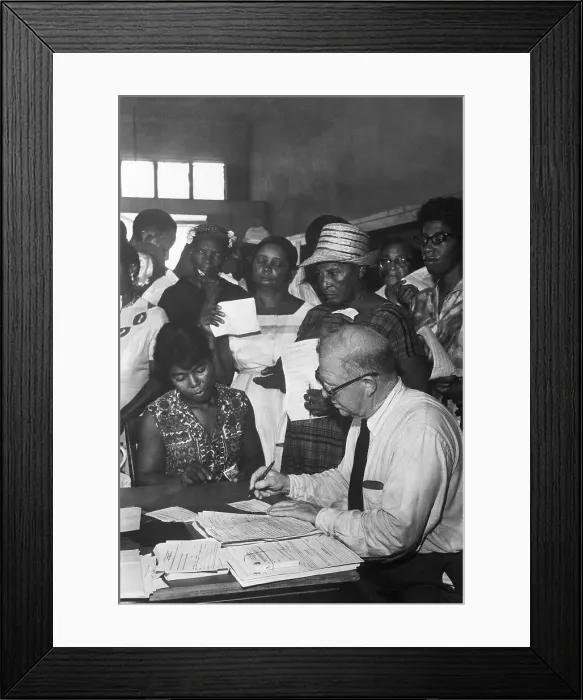 Framed Print : Registrar Fills Out Form Framed Print : Registrar Fills Out Form