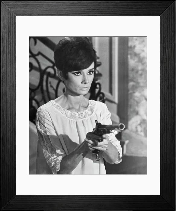 Framed Print : Audrey Hepburn Pointing a Gun