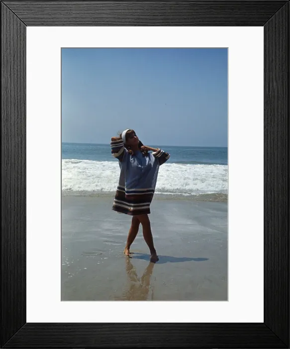 Framed Print : Claudia Cardinale Walking on Beach Shoreline Framed Print : Claudia Cardinale Walking on Beach Shoreline