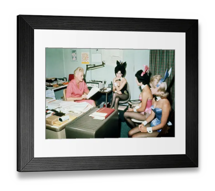 Framed Print : Playboy Bunny Manager With Bunnies in Her Office Framed Print : Playboy Bunny Manager With Bunnies in Her Office
