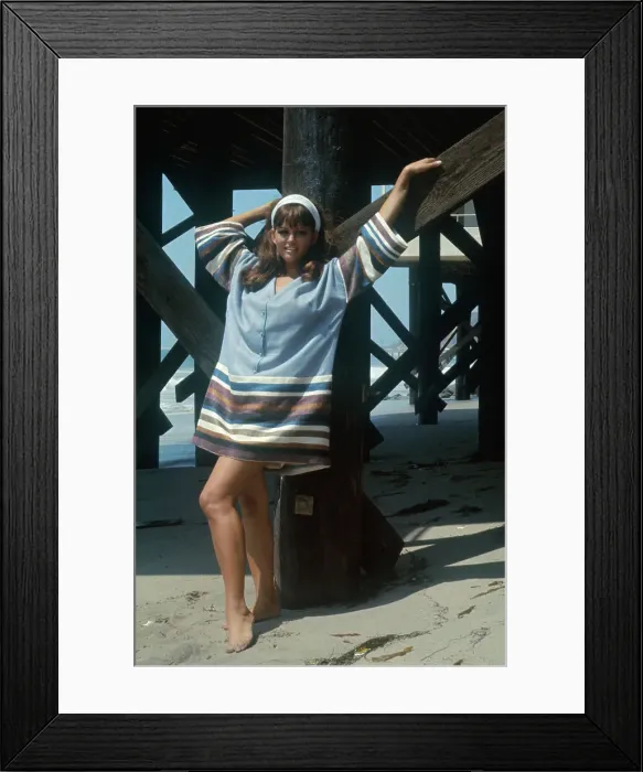 Framed Print : Claudia Cardinale Standing by Boardwalk Framed Print : Claudia Cardinale Standing by Boardwalk