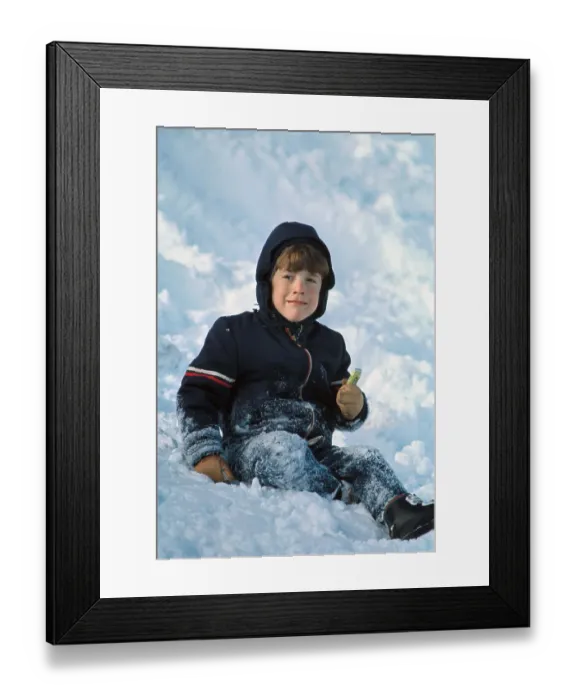 Framed Print : John F Kennedy Jr Frolicking in Snow